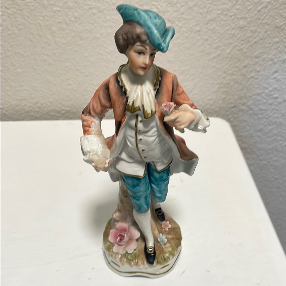 Vintage Porcelain Figurine with Blue and Pink Accents